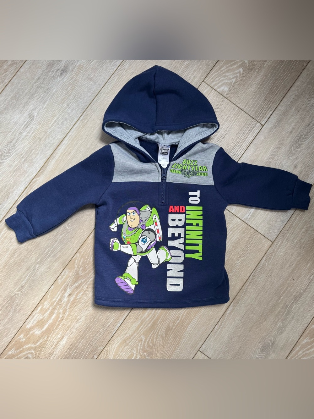 Disney Navy Hoodie with Buzz Lightyear Graphic and Green Accents